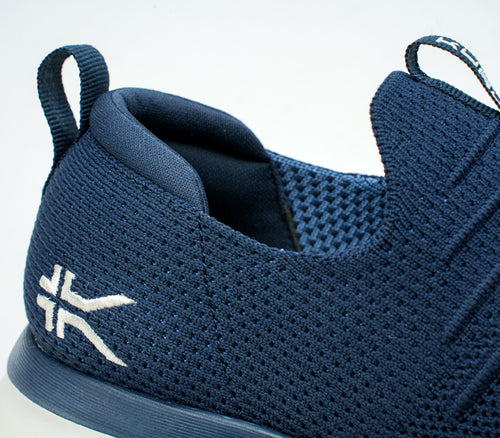 Close-up of the heel on the KURU Footwear ATOM Slip-On Men's Sneaker in MidnightBlue-MineralBlue