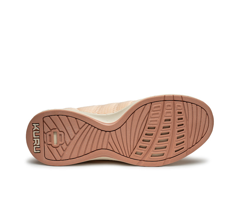 Detail of the sole pattern on the KURU Footwear STRIDE Move Women's Sneaker in PinkSorbet