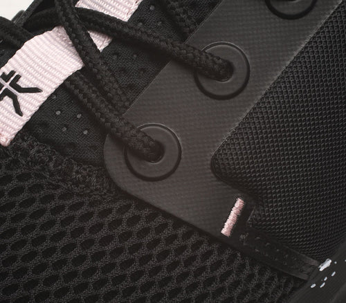 Close-up of the material on the KURU Footwear ATOM Women's Athletic Sneaker in JetBlack-MistyLilac