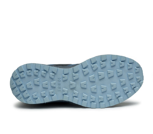 Detail of the sole pattern on the KURU Footwear ATOM Trail Women's Sneaker in BlueFog-MidnightBlue