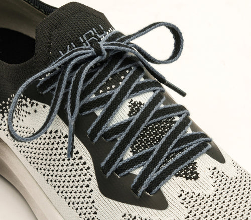 Close-up of the laces on the KURU Footwear FLUX Men's Sneaker in JetBlack-BrightWhite