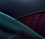 Close-up of the material on the KURU Footwear QUANTUM Women's Fitness Sneaker in ElectricGrape-MidnightBlue-SmokeBlue