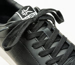 Close-up of the laces on the KURU Footwear ROAM Women's Classic Court Sneaker in JetBlack-BrightWhite
