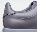 Close-up of the ankle on the KURU Footwear ROAM Women's Classic Court Sneaker in LilacShimmer-BlueFog
