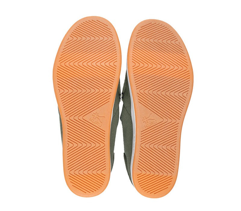 Detail of the sole pattern on the KURU Footwear PACE Men's Slip-on Shoe in OliveGreen-RichWalnut