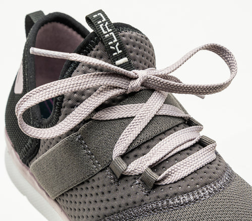 Close-up of the material on the KURU Footwear PIVOT Women's Lace-up Elastic Sneaker in SmokeGray-LavenderThistle