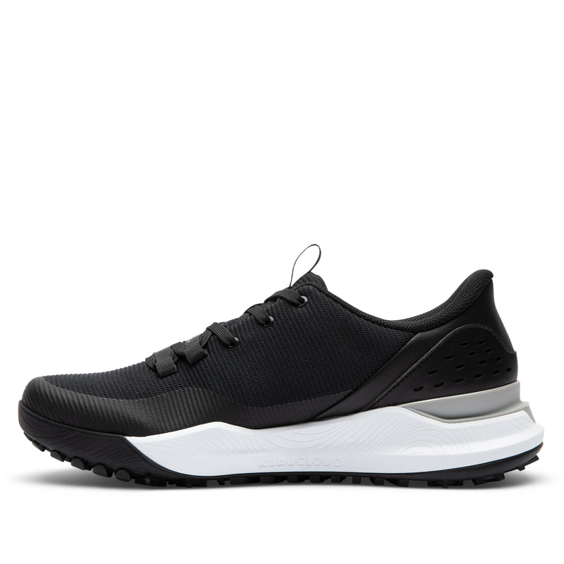 Black sneaker with silver accents on a light gray background