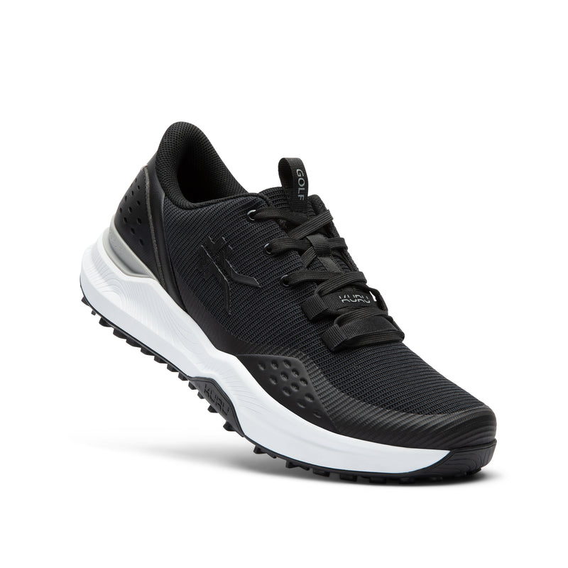 Black and white athletic shoe on a white background