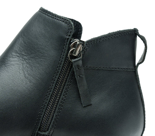 Close-up of the zipper on the KURU Footwear TEMPO Women's Ankle Boot in JetBlack-Gunmetal