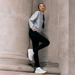 Person wearing KURU ATOM 2 Slip On Women's Sneaker in Dove Gray Gum.