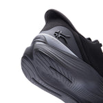 Close-up of the heel cup and KURUSOLE on the KURU ATOM 2 Waterproof Unisex Sneaker in Jet Black-Lead Gray.