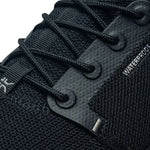 Pair of KURU ATOM Waterproof Men's Sneaker in Jet Black, angled view.