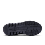 Outsole of the KURU FLEX Via Waterproof Unisex Sneaker in Jet Black-Tungsten Gray, showing the KURUSOLE tread.
