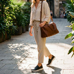 Person wearing KURU ROAM 2 Atla Women's Slip-On in Jet Black Cognac Brown.
