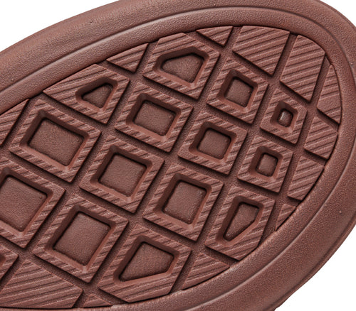 Close-up of the sole on the KURU Footwear MUSE Women's Multi-Strap Sandal in CognacBrown
