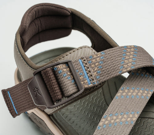 Close-up of the single-pull straps on the KURU Footwear CURRENT Men's Sandal in CedarBrown-MineralBlue
