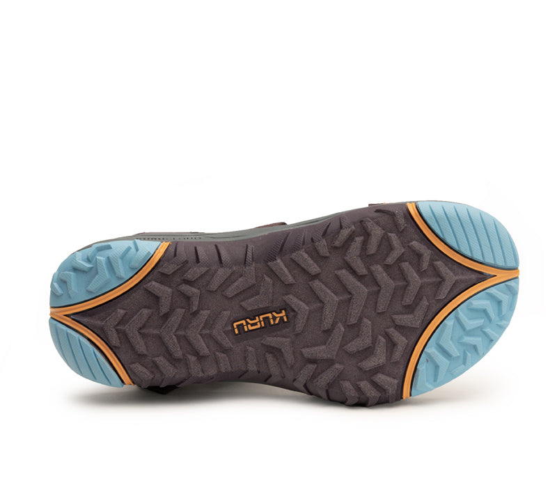 Detail of the sole pattern on the KURU Footwear CURRENT Women's Sandal in Plum-AquaticBlue