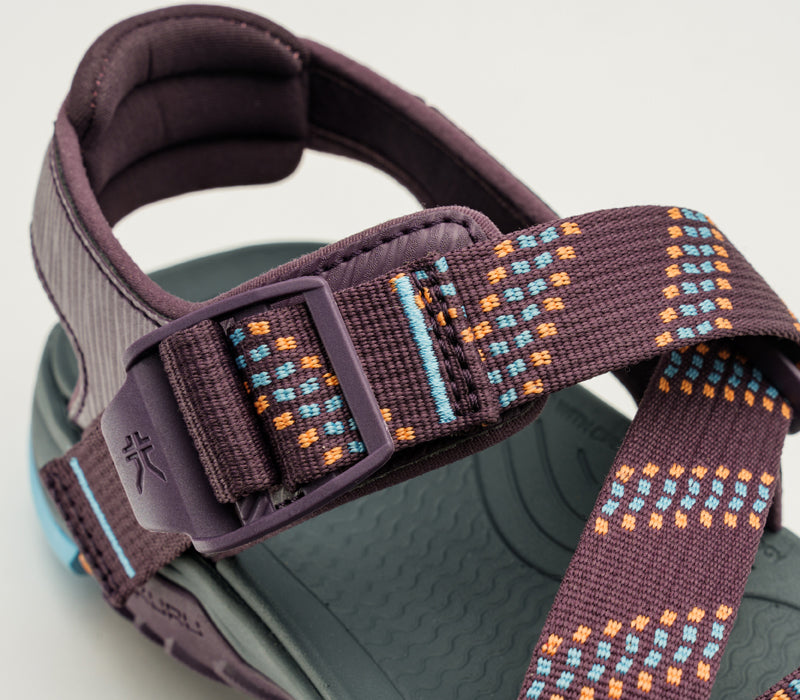 Close-up of the single-pull straps on the KURU Footwear CURRENT Women's Sandal in Plum-AquaticBlue