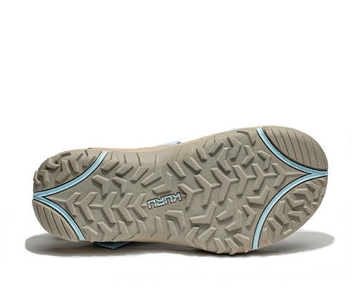 Detail of the sole pattern on the KURU Footwear CURRENT Women's Sandal in Sand-MistyBlue