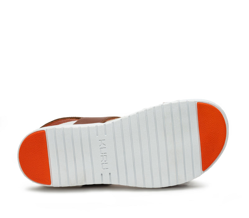 Detail of the sole pattern on the KURU Footwear GLIDE Women's Sandal in WalnutBrown-BloodOrange