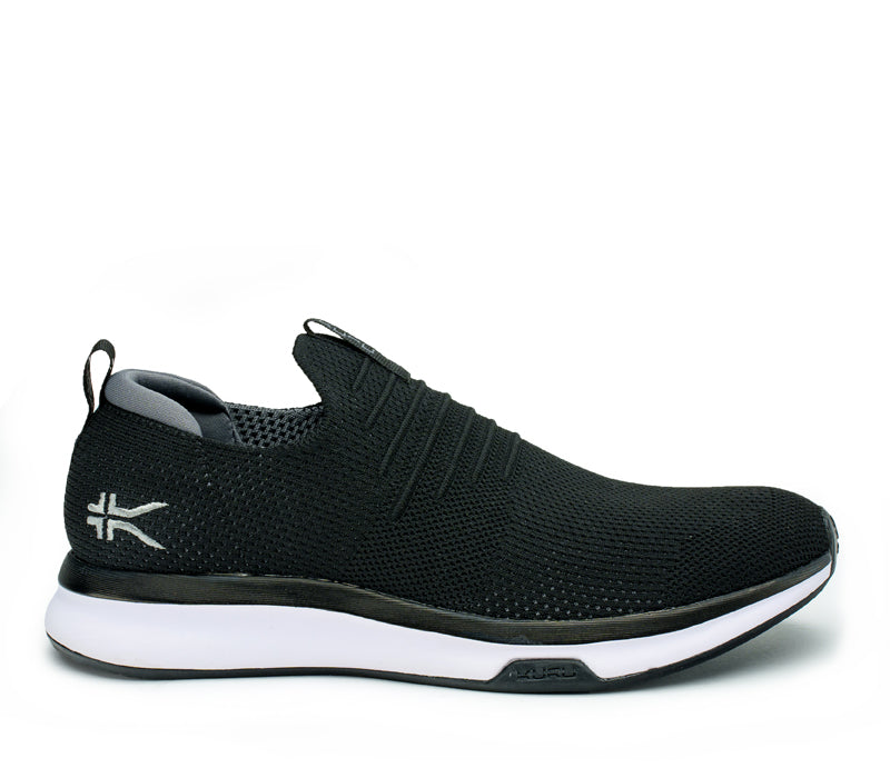 Outside profile details on the KURU Footwear ATOM Slip-On Men's Sneaker in JetBlack-SlateGray