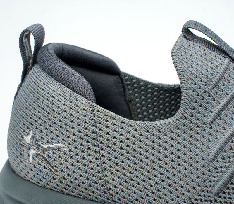 Close-up of the ankle on the KURU Footwear ATOM Slip-On Men's Sneaker in LeadGray