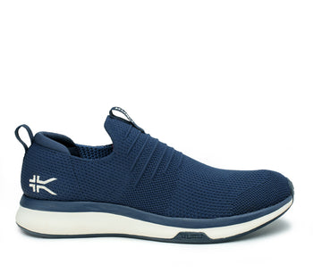 Outside profile details on the KURU Footwear ATOM Slip-On Men's Sneaker in MidnightBlue-MineralBlue