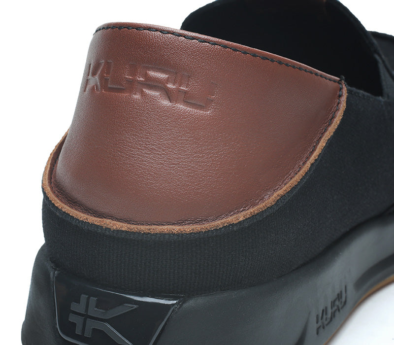 Close-up of the material on the KURU Footwear PACE Men's Slip-on Shoe in JetBlack-RichWalnut