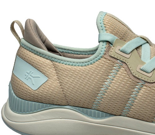 Close-up of the ankle on the KURU Footwear STRIDE Move Women's Sneaker in Sand-MistBlue