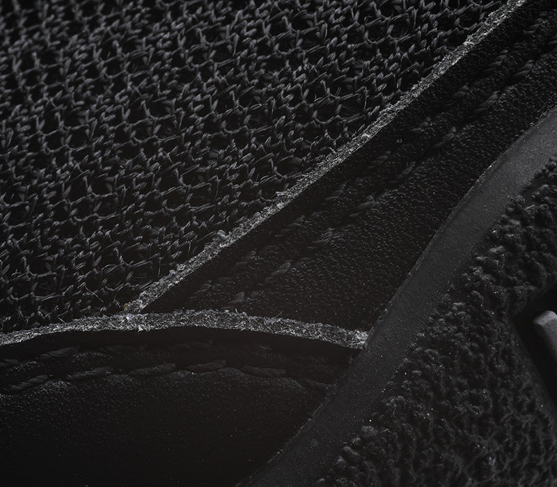 Close-up of the material on the KURU Footwear DRAFT Women's Slipper in JetBlack