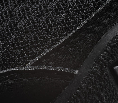 Close-up of the material on the KURU Footwear DRAFT Men's Slipper in JetBlack