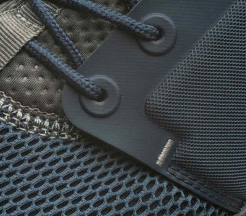 Close-up of the material on the KURU Footwear ATOM WIDE Men's Athletic Sneaker in Indigo-White-Basalt