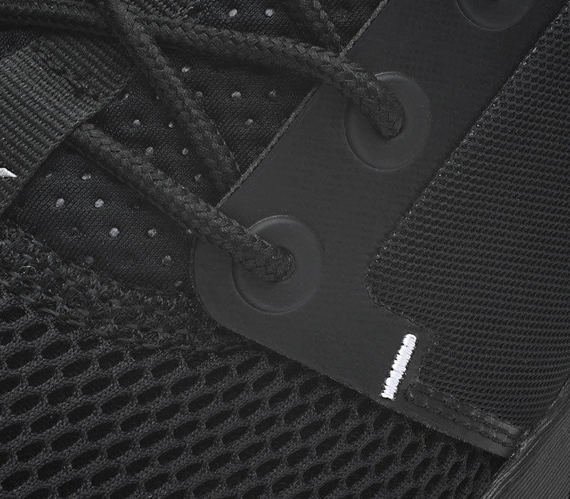 Close-up of the material on the KURU Footwear ATOM Women's Athletic Sneaker in JetBlack-White-Gum