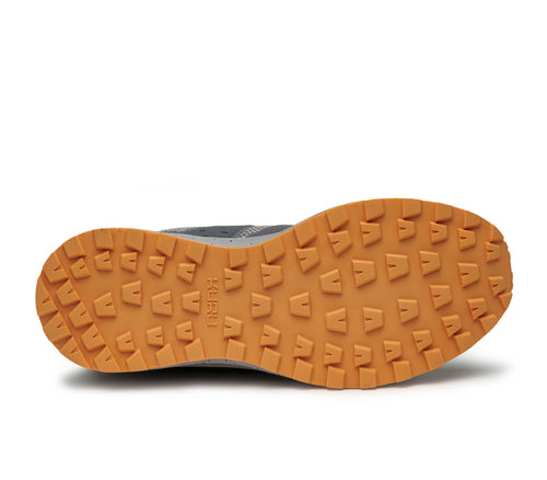 Detail of the sole pattern on the KURU Footwear ATOM Trail Women's Sneaker in SmokeGray-Apricot