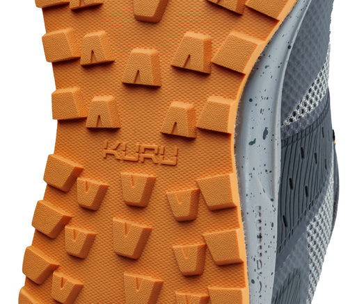 Close-up of the sole on the KURU Footwear ATOM Trail Women's Sneaker in SmokeGray-Apricot