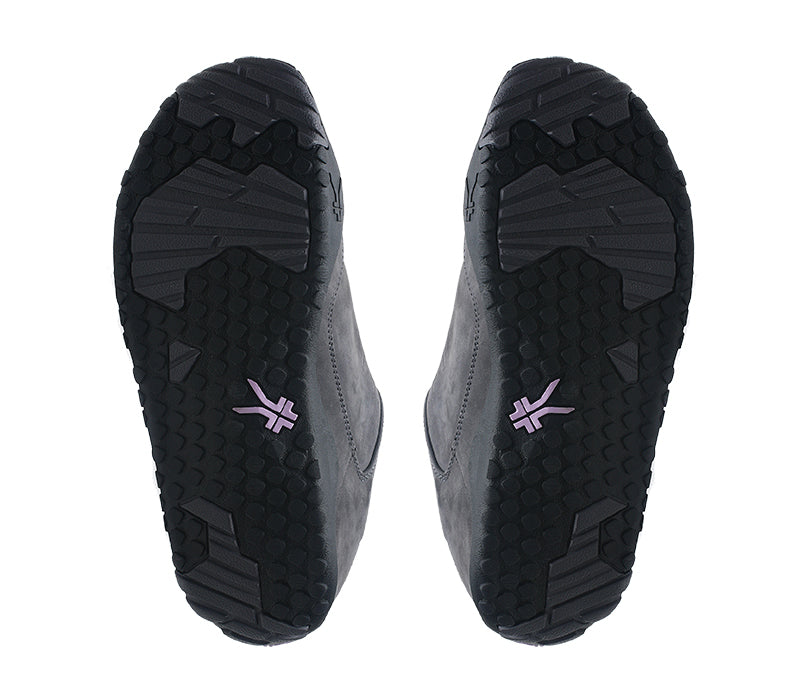 Detail of the sole pattern on the KURU Footwear CHICANE Women's Trail Hiking Shoe in SmokeGray-JetBlack-Violet