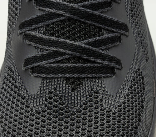 Close-up of the material on the KURU Footwear FLUX Women's Sneaker in JetBlack-SmokeGray