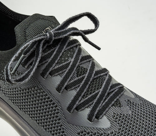 Close-up of the laces on the KURU Footwear FLUX Men's Sneaker in JetBlack-SmokeGray