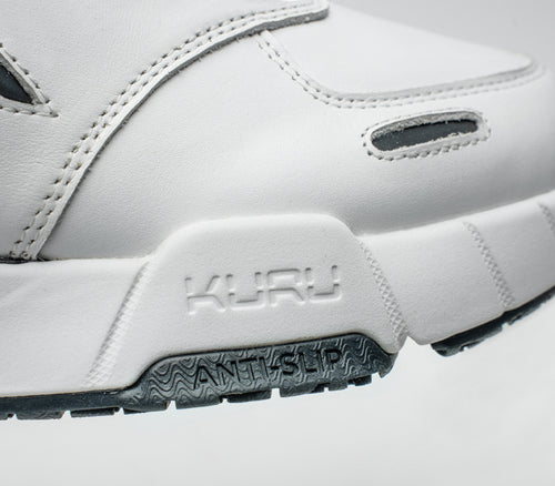 Close-up of the side of the KURU Footwear KINETIC 2 Men's Anti-Slip Sneaker in BrightWhite-Graphite