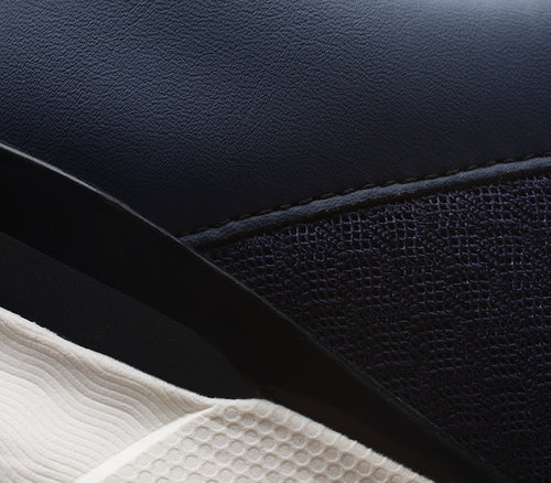 Close-up of the material on the KURU Footwear QUANTUM WIDE Men's Fitness Sneaker in MidnightBlue-White-JetBlack