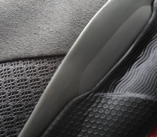 Close-up of the material on the KURU Footwear QUANTUM Men's Fitness Sneaker in Tungsten-CardinalBlack
