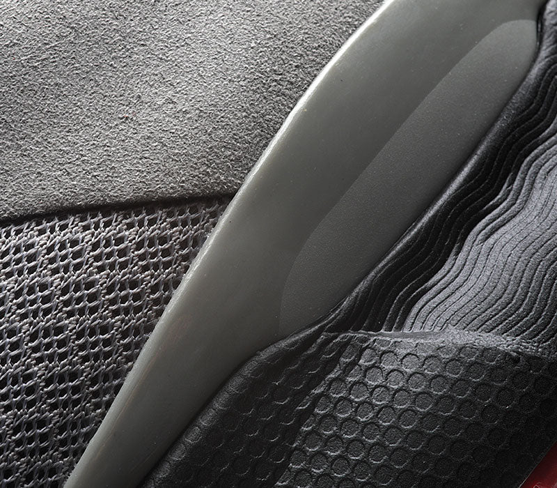 Close-up of the material on the KURU Footwear QUANTUM WIDE Men's Fitness Sneaker in Tungsten-CardinalBlack