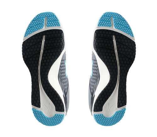 Detail of the sole pattern on the KURU Footwear QUANTUM WIDE Women's Fitness Sneaker in UrbanConcrete-White-TopazBlue