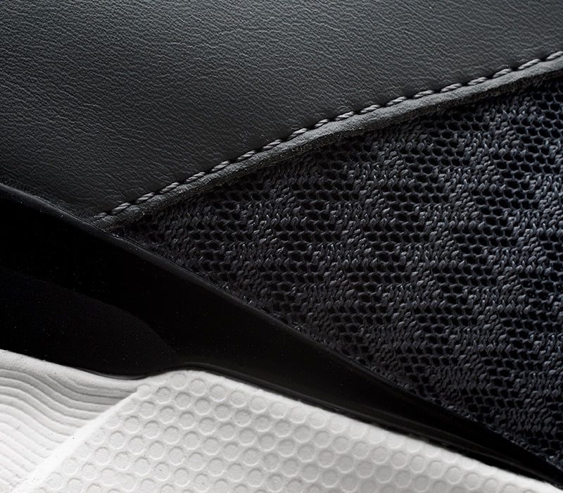 Close-up of the material on the KURU Footwear QUANTUM WIDE Women's Fitness Sneaker in UrbanConcrete-White-TopazBlue