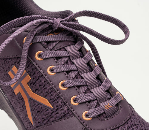 Close-up of the laces on the KURU Footwear QUANTUM Women's Fitness Sneaker in VioletStorm-BlackberrySorbet-Copper