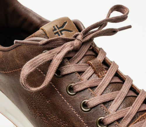 Close-up of the laces on the KURU Footwear ROAM Men's Classic Court Sneaker in CloveBrown