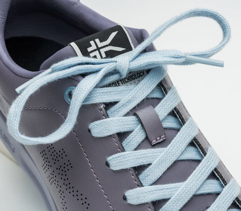Close-up of the laces on the KURU Footwear ROAM Women's Classic Court Sneaker in LilacShimmer-BlueFog