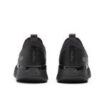 Black athletic shoes with 'Kuru' branding on a white background