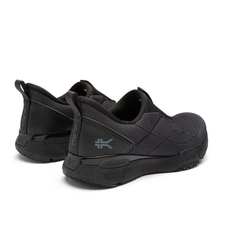 Black athletic shoes with brand logo on a white background