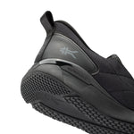 Black slip-on shoe with 'KURUSOLE' branding on a white background